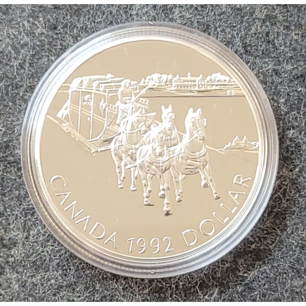 1992 RCM SILVER DOLLAR COIN