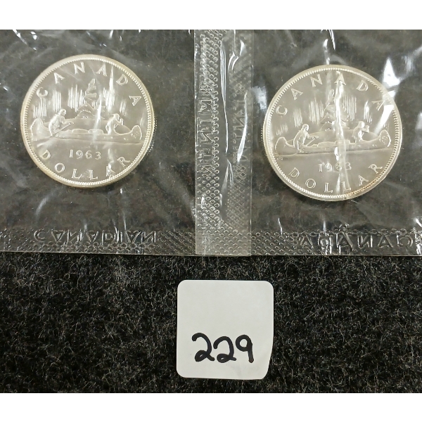  LOT OF 2 - 1963 CDN SILVER DOLLARS - VOYAGEUR