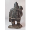 Image 4 : HUNTER CARRYING SEAL TAIL - SIGNED - STONE