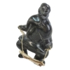HUMAN CARRYING ANIMAL HIDE - SIGNED - STONE & LEATHER