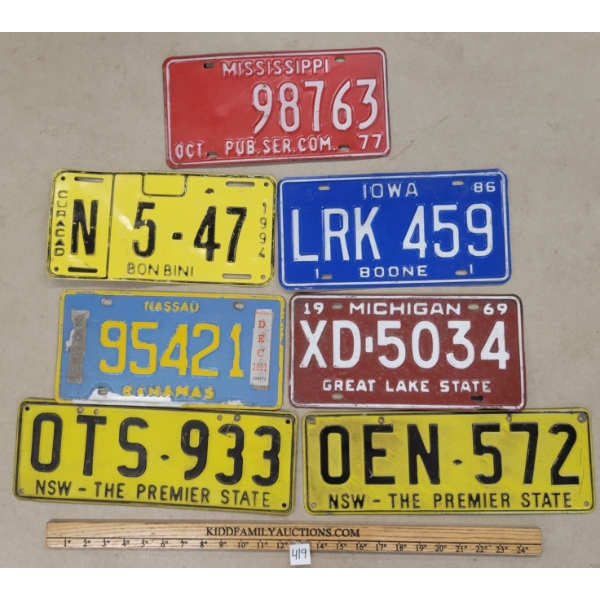 LOT OF 7 - U.S., CURACAO & BAHAMAS LICENCE PLATES