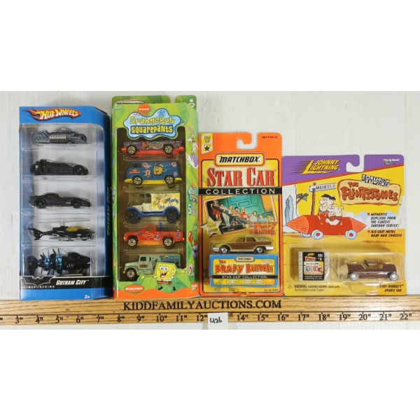 LOT OF 4 - HOTWHEELS GOTHAM CITY, PLAYING MANTIS THE FLINSTONES, MATCHBOX BRADY BUNCH, ETC