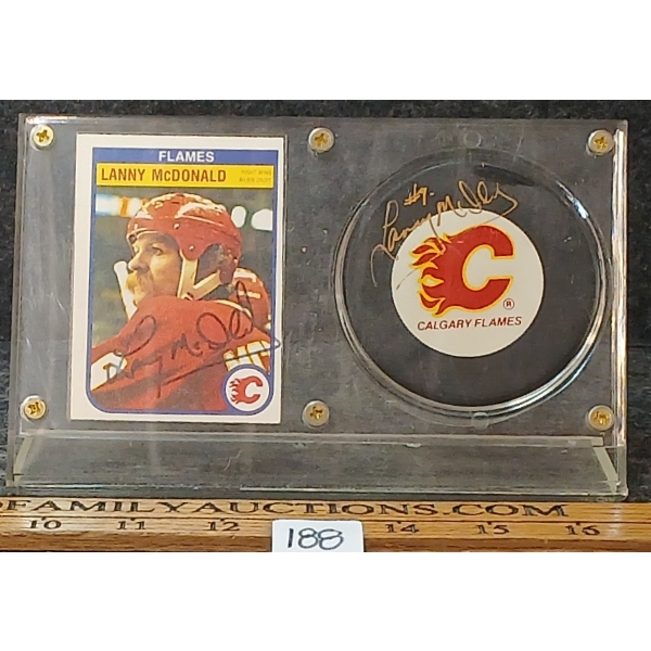 1981-1982 OPC NHL CALGARY FLAMES LANNY MCDONALD HOCKEY CARD & PUCK - AUTOGRAOHED
