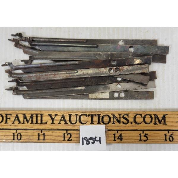 LOT OF 9 - REMINGTON 1100 FEED LATCHES - 12GA