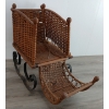 CHILD'S ADJUSTABLE WICKER SLEIGH