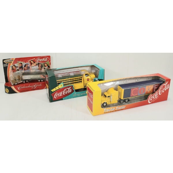 LOT OF 3 - COCA-COLA DIECAST TRACTOR TRAILER, 1953 COIN BANK & MATCHBOX CALENDAR GIRLS - SEALED