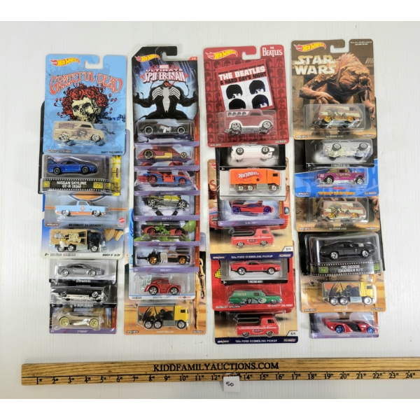 LOT OF 30 - DIECAST HOTWHEELS - ULTIMATE SPIDER-MAN, 007 SKYFALL, THE BEATLES, ETC 