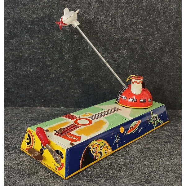 TIN WIND-UP & BATTERY OP SKY ROCKET