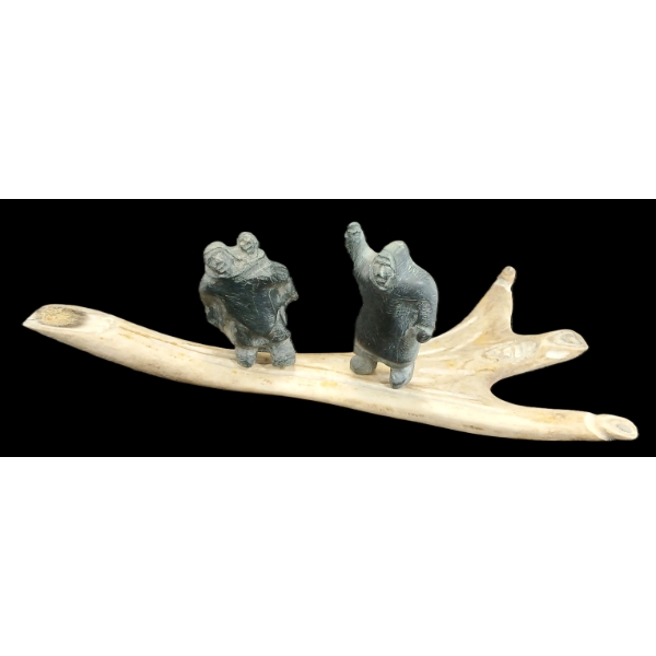 FAMILY W/ SPIRITUAL FIGURE BASE BY KOOVEYUK NATISAPIK - STONE & BONE