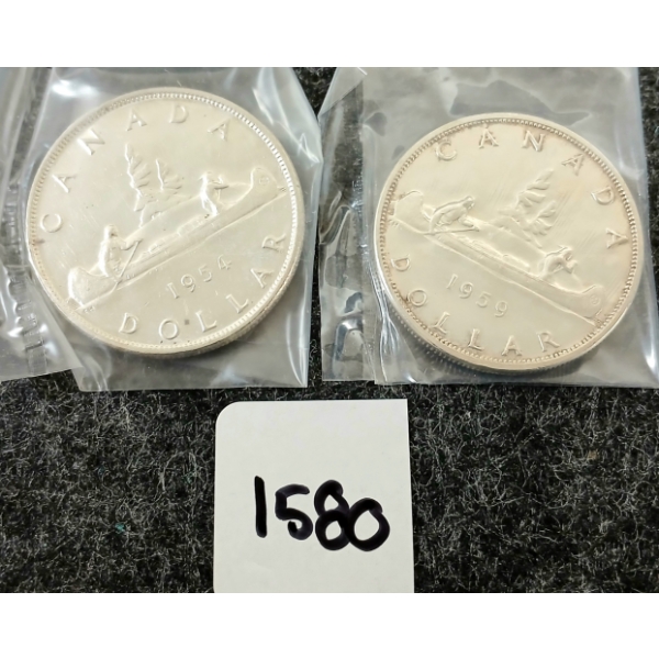 LOT OF 2 - 1954 & 1959 CDN SILVER DOLLARS - VOYAGEUR