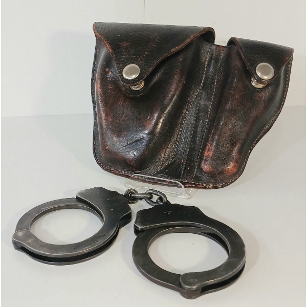 LOT OF 2 - PAIR OF PEERLESS HANDCUFFS & LEATHER HOLSTER