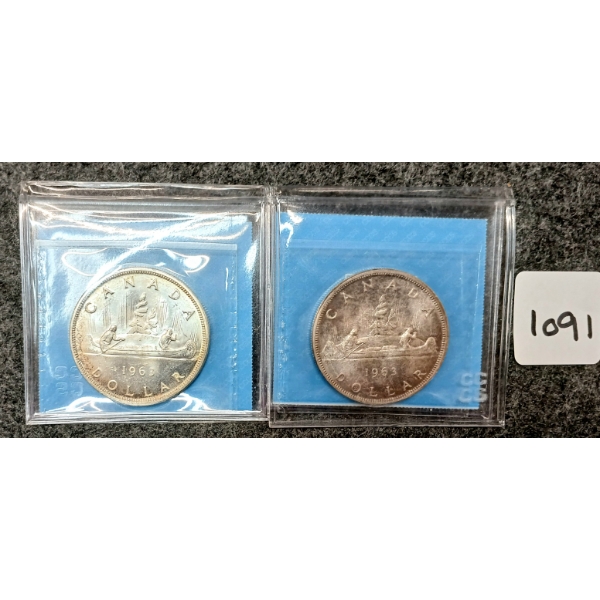 LOT OF 2 - 1963 CDN SILVER DOLLARS - VOYAGEUR - CCCS GRADED