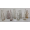 Image 2 : LOT OF 8 - CLEAR & PURPLE TINTED EMBOSSED SODA BOTTLES - INCL HOSMER, W.M. ROBERTSON, ETC