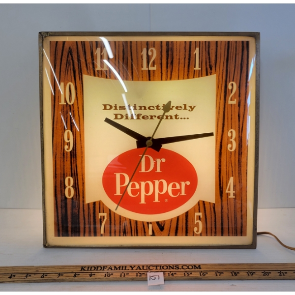 DR. PEPPER "DISTINCTIVELY DIFFERENT" LIGHT UP WALL CLOCK
