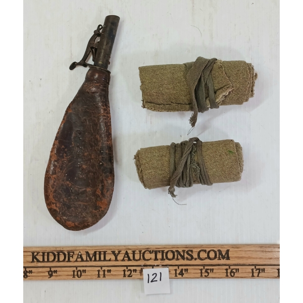 LOT OF 2 - PAIR OF PUTTEES & LEATHER SHOTFLASK