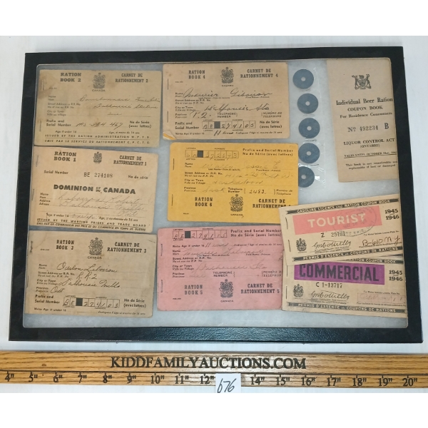 QTY OF RATION TOKENS & BOOKLETS IN DISPLAY CASE