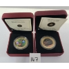 LOT OF 2 - RCM 2007 & 2009 50 CENT HOLIDAY ORNAMENTS & TRAIN COINS