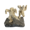 Image 1 : DANCING INUIT BY OLAYUQ KITZUTUKAJUK - WHALE BONE & STONE