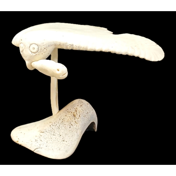 HAWK CARRYING CATCH BY KAROO ASHEVAK (1940 - 1974) - BONE