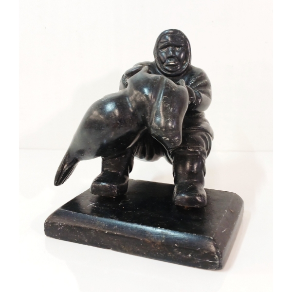 "MAN HOISTING SEAL" BY LUCASSIE - STONE & WOOD