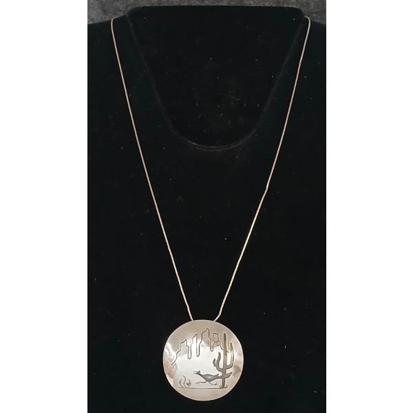 HAND-CRAFTED PENDANT ON STERLING SILVER CHAIN