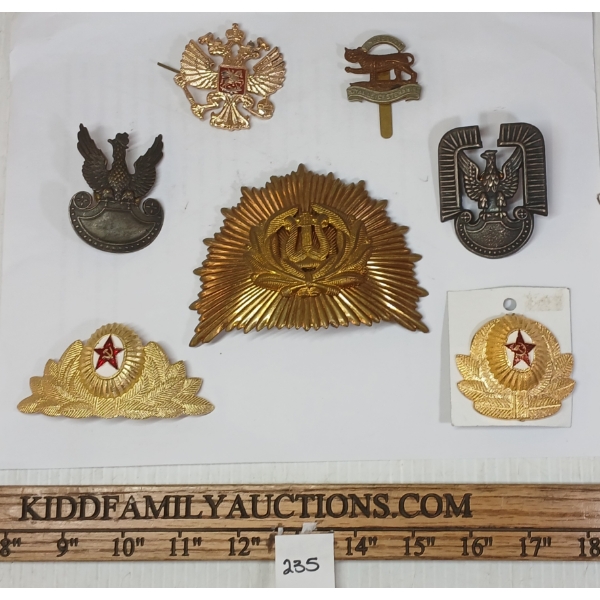LOT OF 7 - BADGES - INCL RUSSIAN CAP BADGES, SOVIET POLICE, POLISH ARMY & ROYAL LEICESTERSHIRE