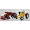 Image 1 : LOT OF 2 - SPEC-CAST DIECAST INTERNATIONAL HARVESTER 1964 CUB SQUARE HOOD TRACTOR MODELS 