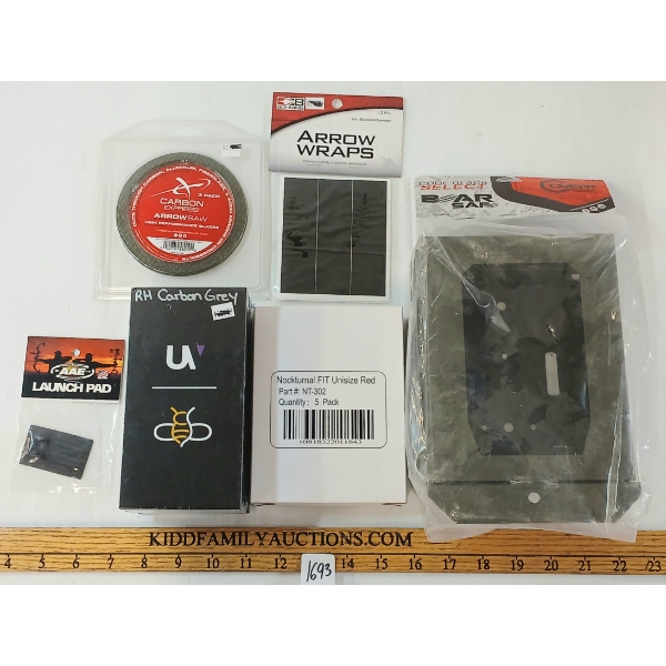 LOT OF 6 - ARCHERY ACCESSORIES - TRAIL CAM CASE, LAUNCHPAD, GRIPS, NOCKS, ETC