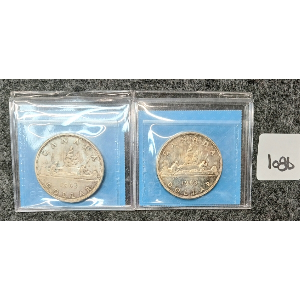 LOT OF 2 - 1963 CDN SILVER DOLLARS - VOYAGEUR - CCCS GRADED