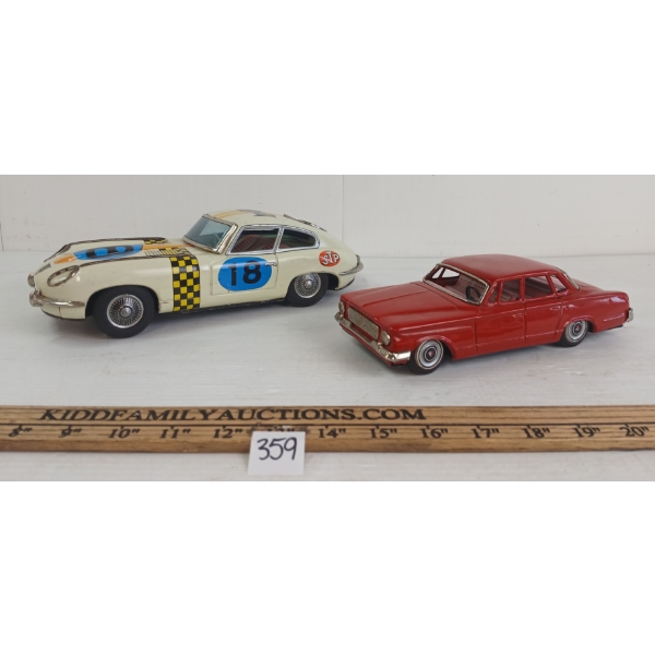 LOT OF 2 - TIN FRICTION PLYMOUTH VALIANT & RACE CAR