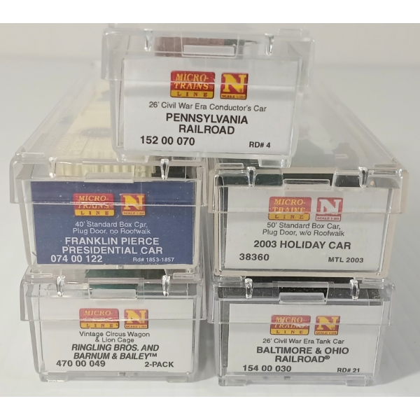 LOT OF 5 - MICRO TRAINS - CHRISTMAS, CIRCUS, PRESIDENTIAL & UNION PACIFIC CAR SERIES