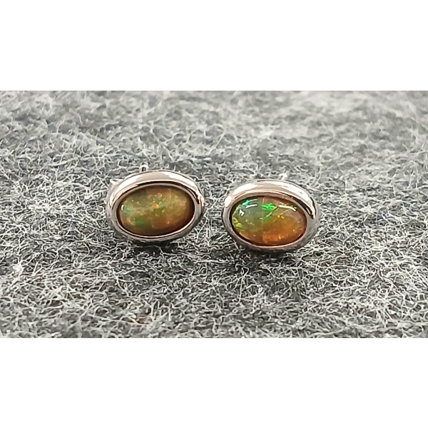 PAIR OF STERLING SILVER NATURAL BLACK OPAL STUD EARRINGS ($1,121.00 APPRAISAL)