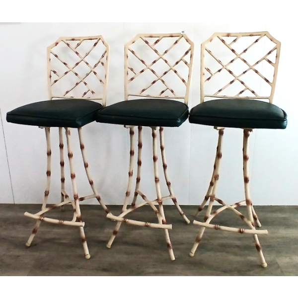 LOT OF 3 - CAST IRON TIKI BAR STOOLS W/ GREEN VINYL SEATS