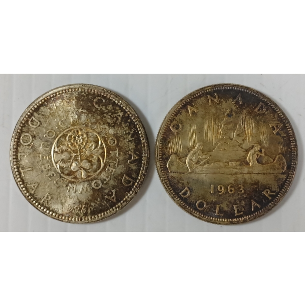 LOT OF 2 - 1963 & 1964 CDN SILVER DOLLARS - CHARLOTTETOWN & VOYAGEUR