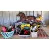 Image 1 : SHELF LOT - INCLUDES GARDEN ART, JD AIR FILTER, TARP 10 X 12 FT (NEW), SCREWDRIVERS