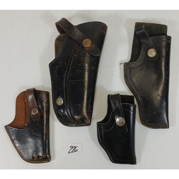 LOT OF 4 - LEATHER HANDGUN HOLSTERS - BROWNING & COURTLANDT