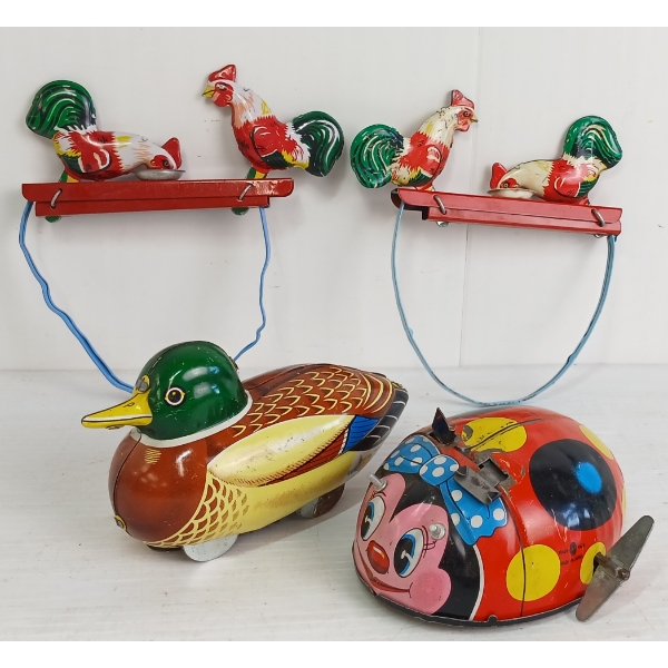LOT OF 4 - TIN SHAKE & WIND UP TOYS