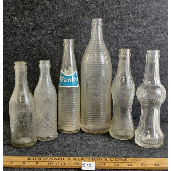 LOT OF 6 - EMBOSSED SODA BOTTLES - INCL 1922 ORANGE CRUSH, FANTA, WHISTLE, ORANGE DANDY, ETC 