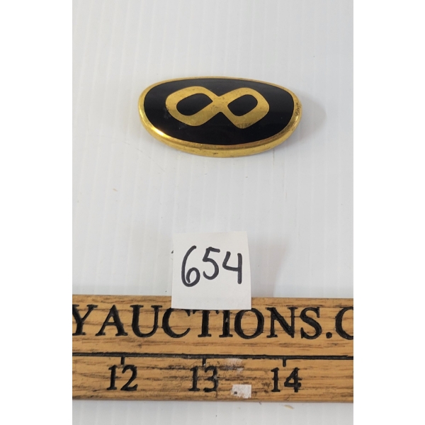 CHRYSLER(?) RAD BADGE