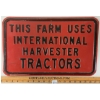 Image 1 : "THIS FARM USES INTERNATIONAL HARVESTER TRACTORS" - SINGLE SIDED METAL SIGN