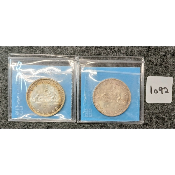 LOT OF 2 - 1963 CDN SILVER DOLLARS - VOYAGEUR - CCCS GRADED