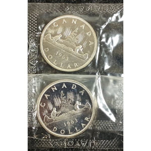 LOT OF 2 - 1963 CDN UNCIRCULATED SILVER DOLLAR - VOYAGEUR 