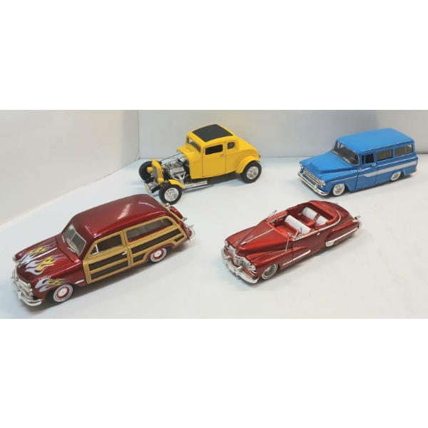 LOT OF 4 - ERTL & JADA DIECAST MODELS - FORD WOODY WAGON, 1957 CHEVY SUBURBAN,1947 CADILLAC, ETC