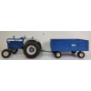 Image 1 : ERTL CO. PRESSED STEEL FORD 8600 TRACTOR & THE BIG BLUE TRAILER