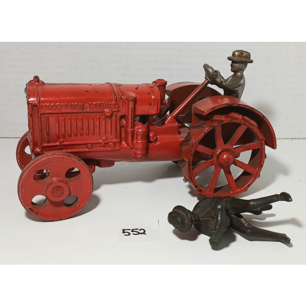 ARCADE TOY(?) CAST IRON MCCORMICK DEERING TRACTOR W/ NICKEL & CAST IRON DRIVERS 