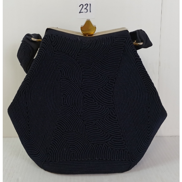 CORDED HEXAGON CLUTCH PURSE 