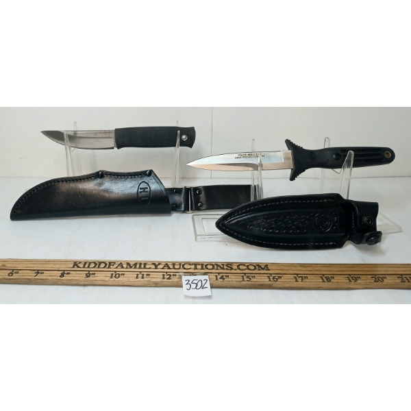 LOT OF 2 - S&W & H1 KNIVES W/ LEATHER SHEATHS
