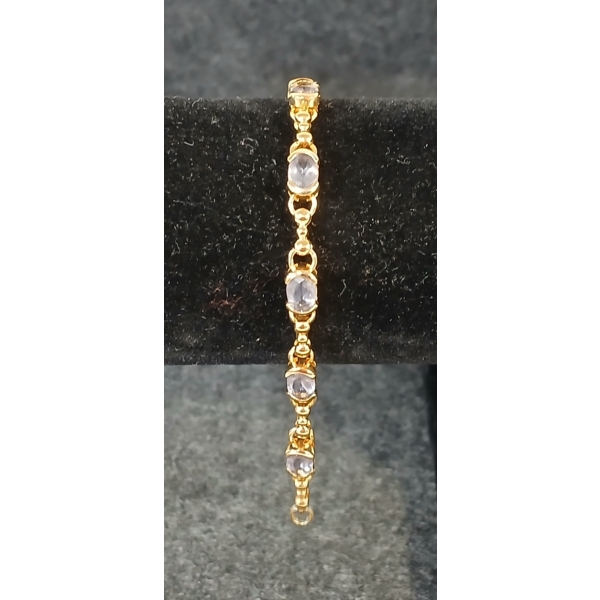 GOLD TONED BRACELET W/ INDIGO RHINESTONES