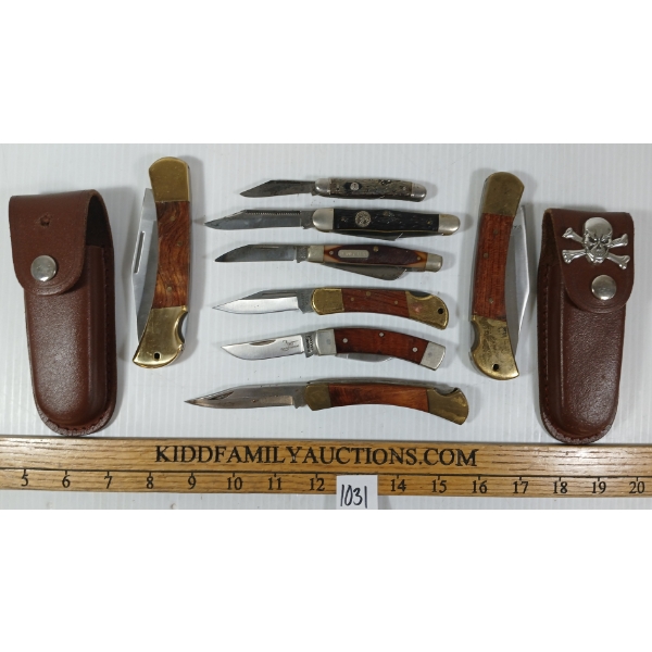 LOT OF 8 - FOLDING KNIVES W/ SHEATHS