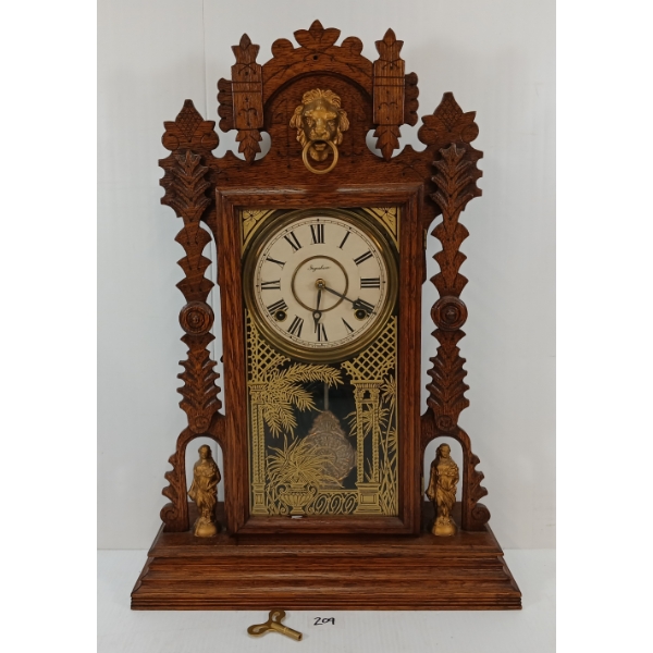 1894 E. INGRAHAM "SHEKEL" 8 DAY OAK SHELF CLOCK
